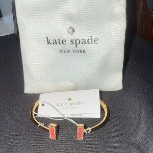 Kate Spade Gold Cuff with Red Details